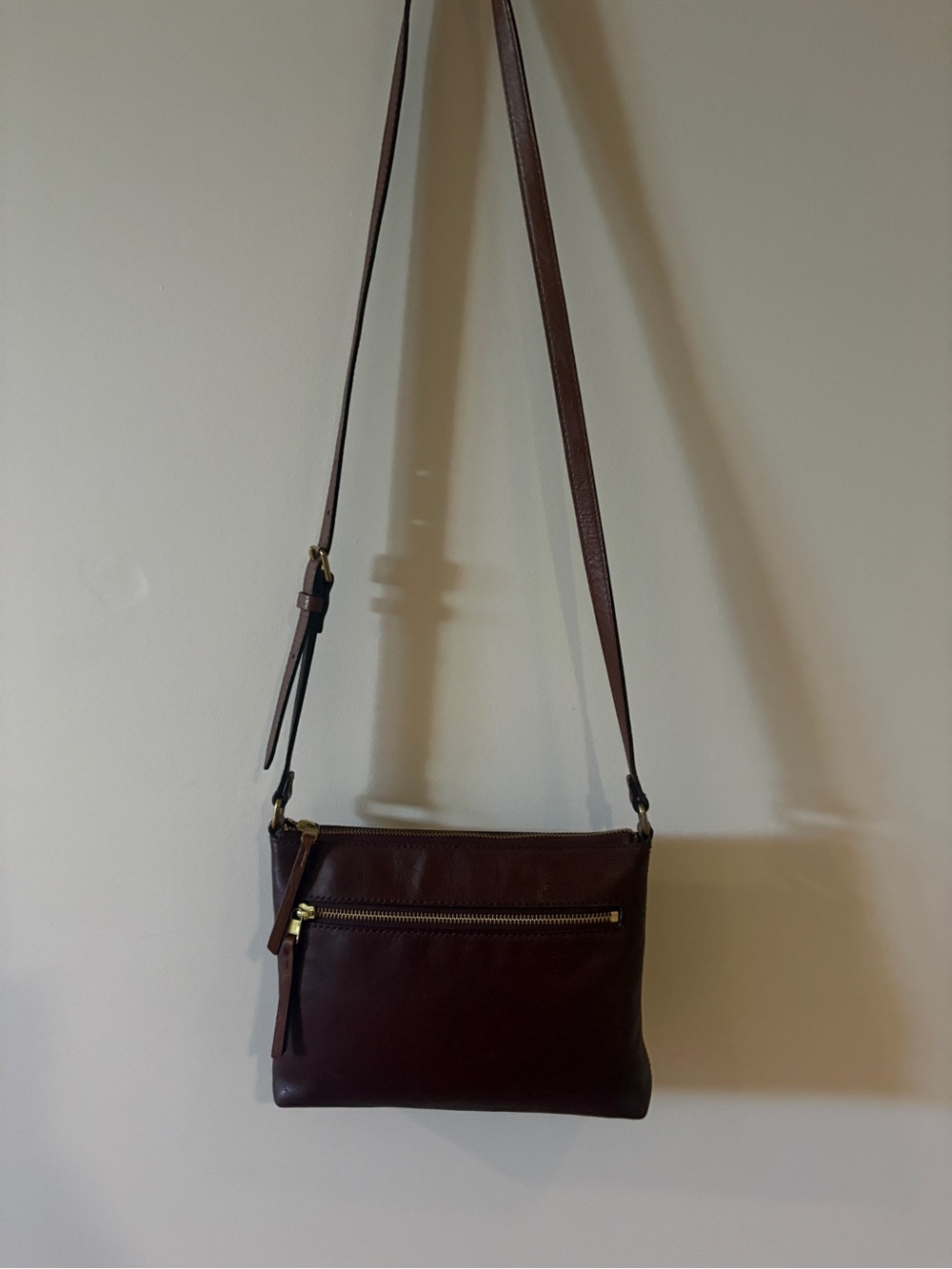 Fossil plum bag with adjustable strap